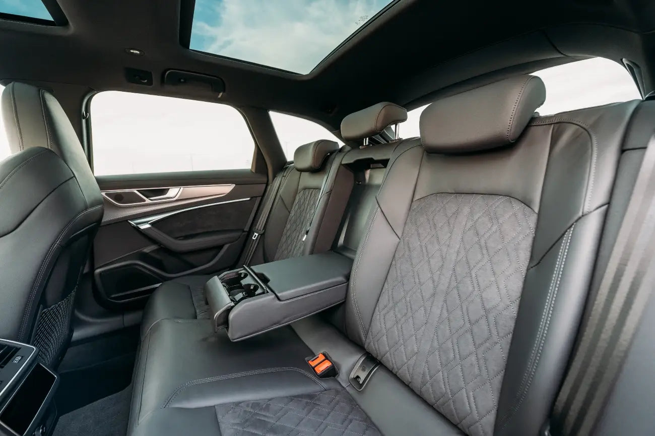 Interior shot of an Audi RS6, showcasing its luxurious leather seats and advanced dashboard, available in Dubai.