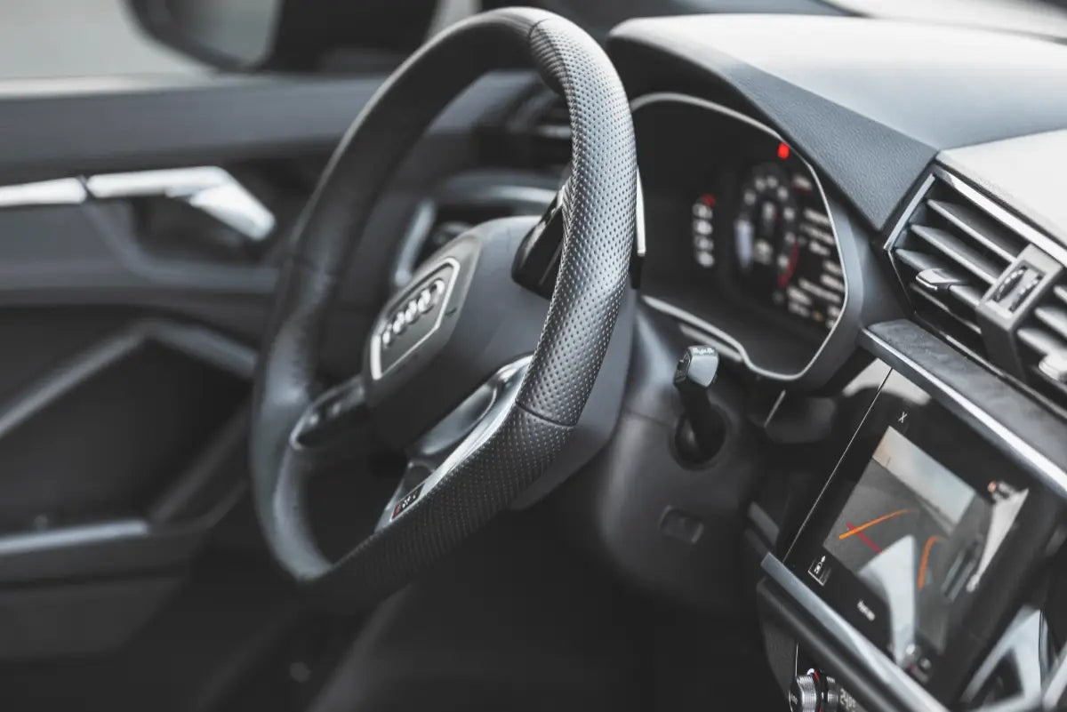 Close-up of the Audi RSQ3's distinctive grille and headlights, available for rent in Dubai.