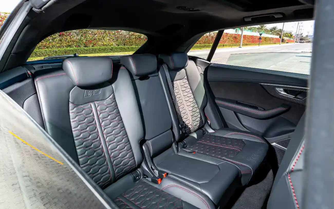 Elevated view of the Audi RSQ8, showcasing its robust body and stylish roof design for Dubai renters.