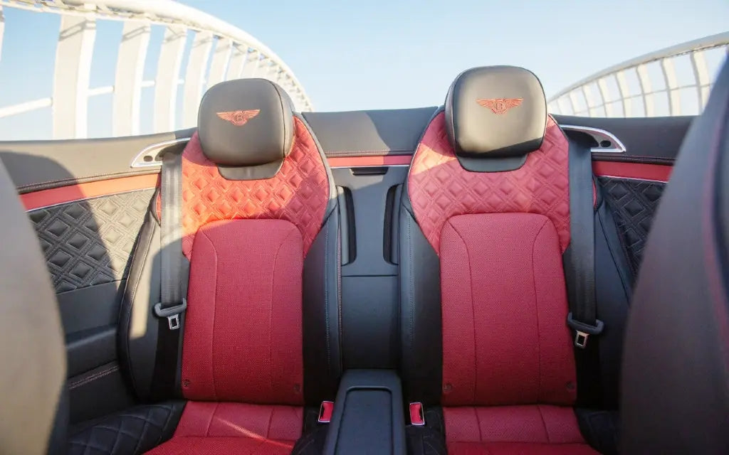 Spacious and luxurious seating inside Bentley Continental GTC V12, perfect for Dubai rentals.