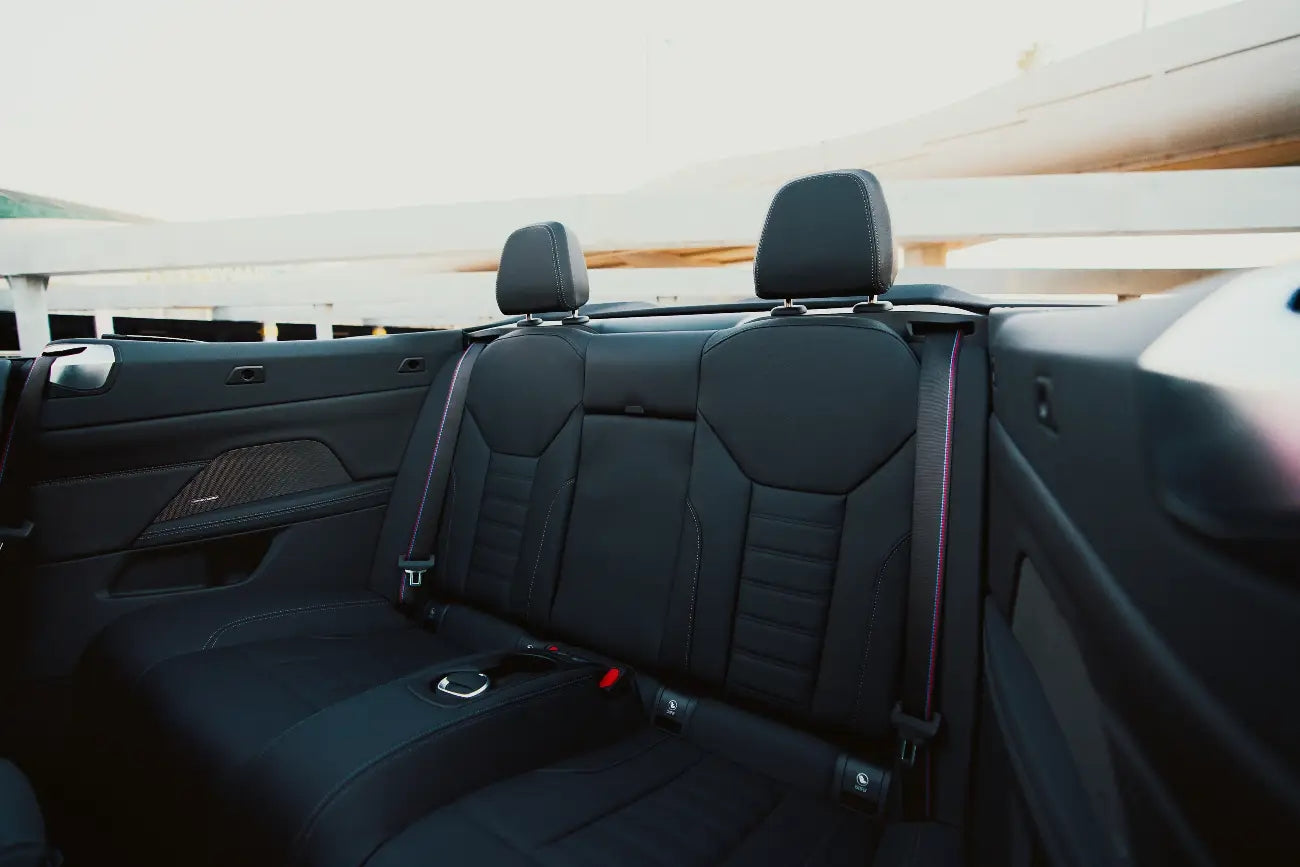 Drive the iconic BMW M440i Cabrio in Dubai, showcasing its powerful stance and luxury appeal.