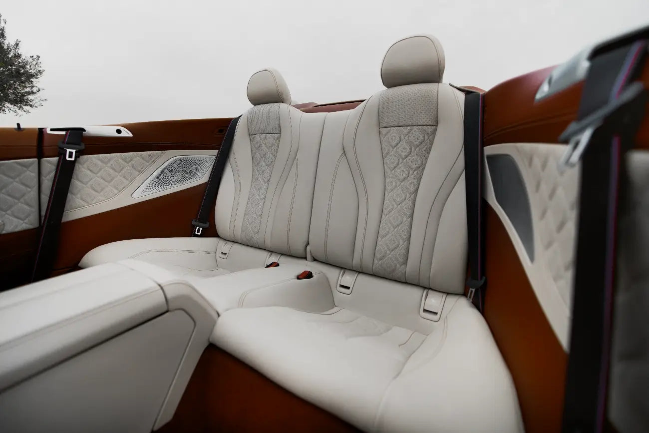 BMW M8 Competition convertible under Dubai's skyline, ready for an unforgettable rental.