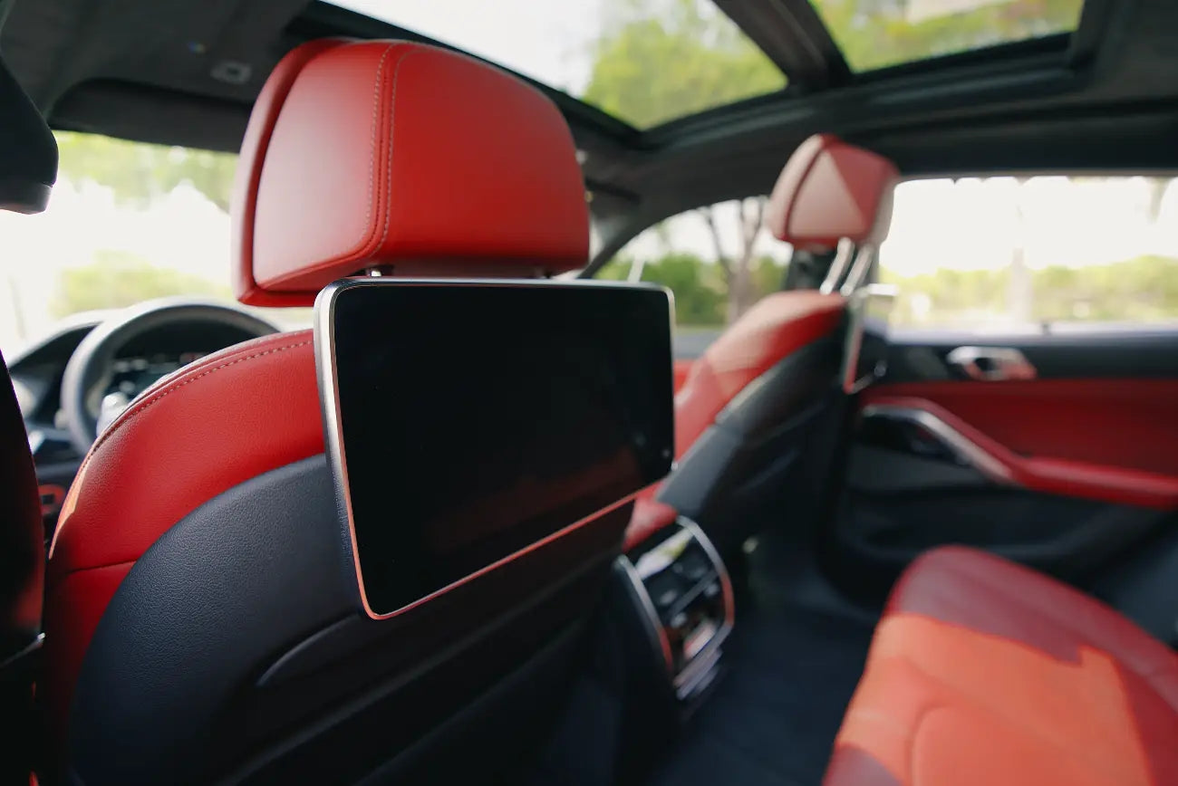 Bird's-eye view of a BMW X6 M50i, capturing the spacious and luxurious design of this top rental SUV in Dubai.