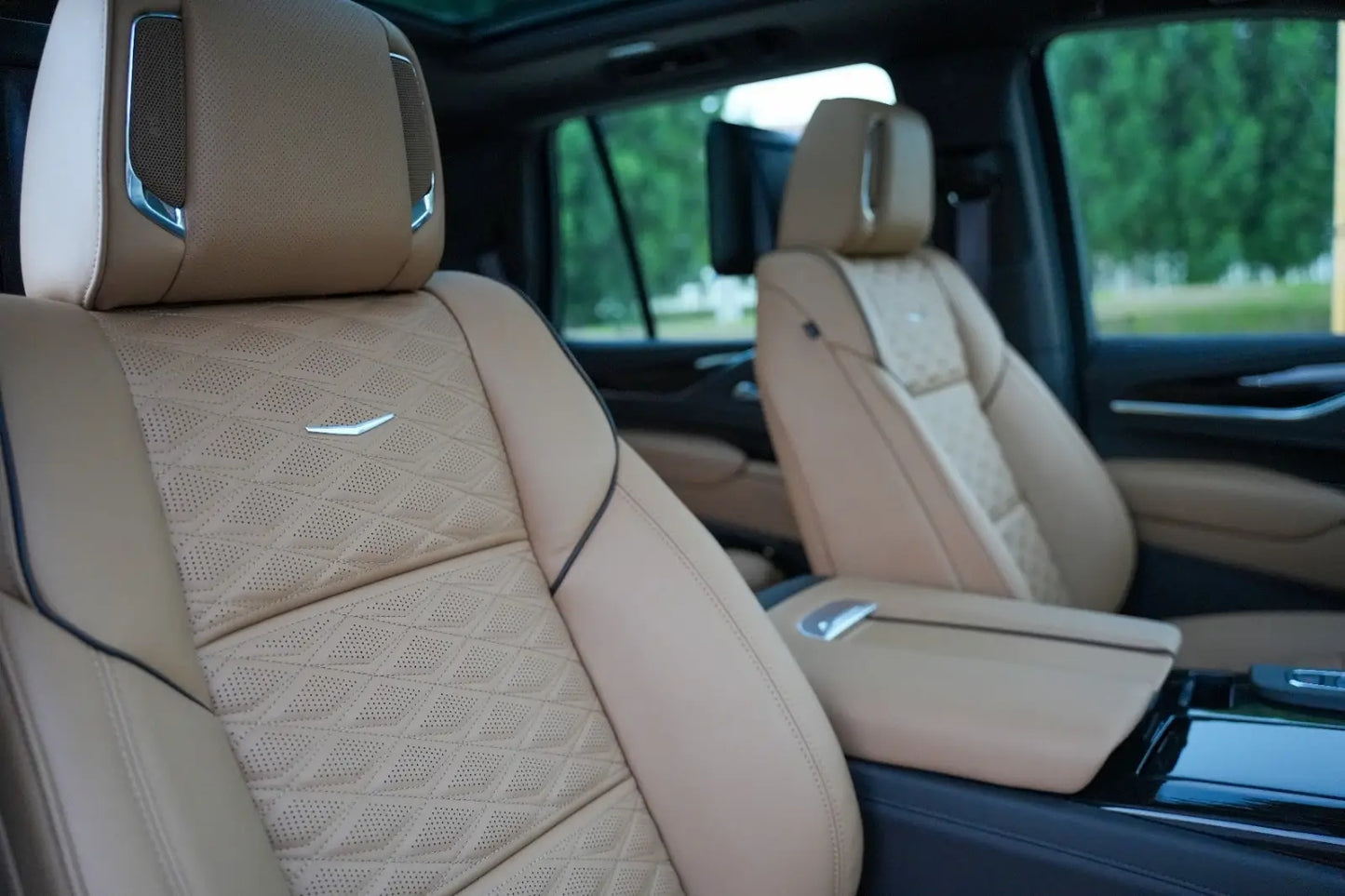 Rear view of a Cadillac Escalade, highlighting ample cargo space for a premium rental experience in Dubai.