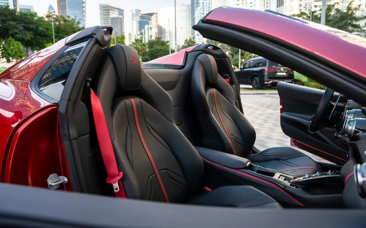 Rear angle of the Ferrari 812 GTS Spyder, highlighting its distinctive taillights and exhaust, perfect for Dubai's luxury car rental market.
