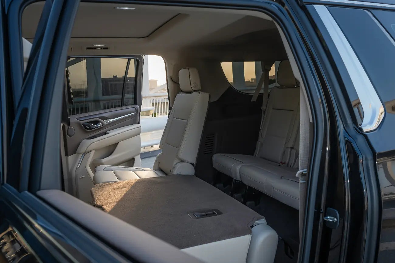 Inside cockpit view of GMC Denali XL, blending luxury and technology for Dubai explorers.