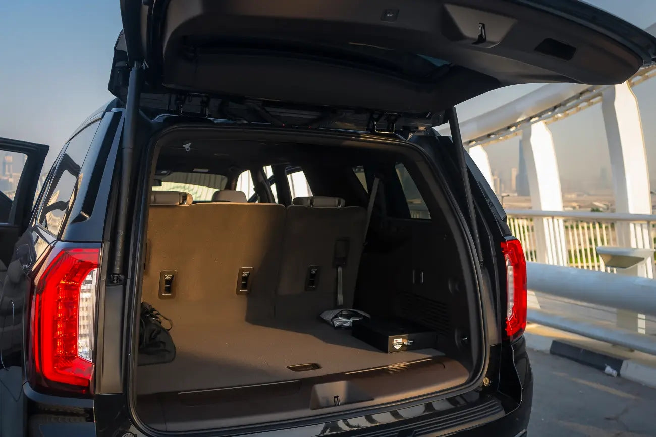 Close-up of GMC Yukon XL dashboard and high-tech features for a luxurious drive in Dubai.