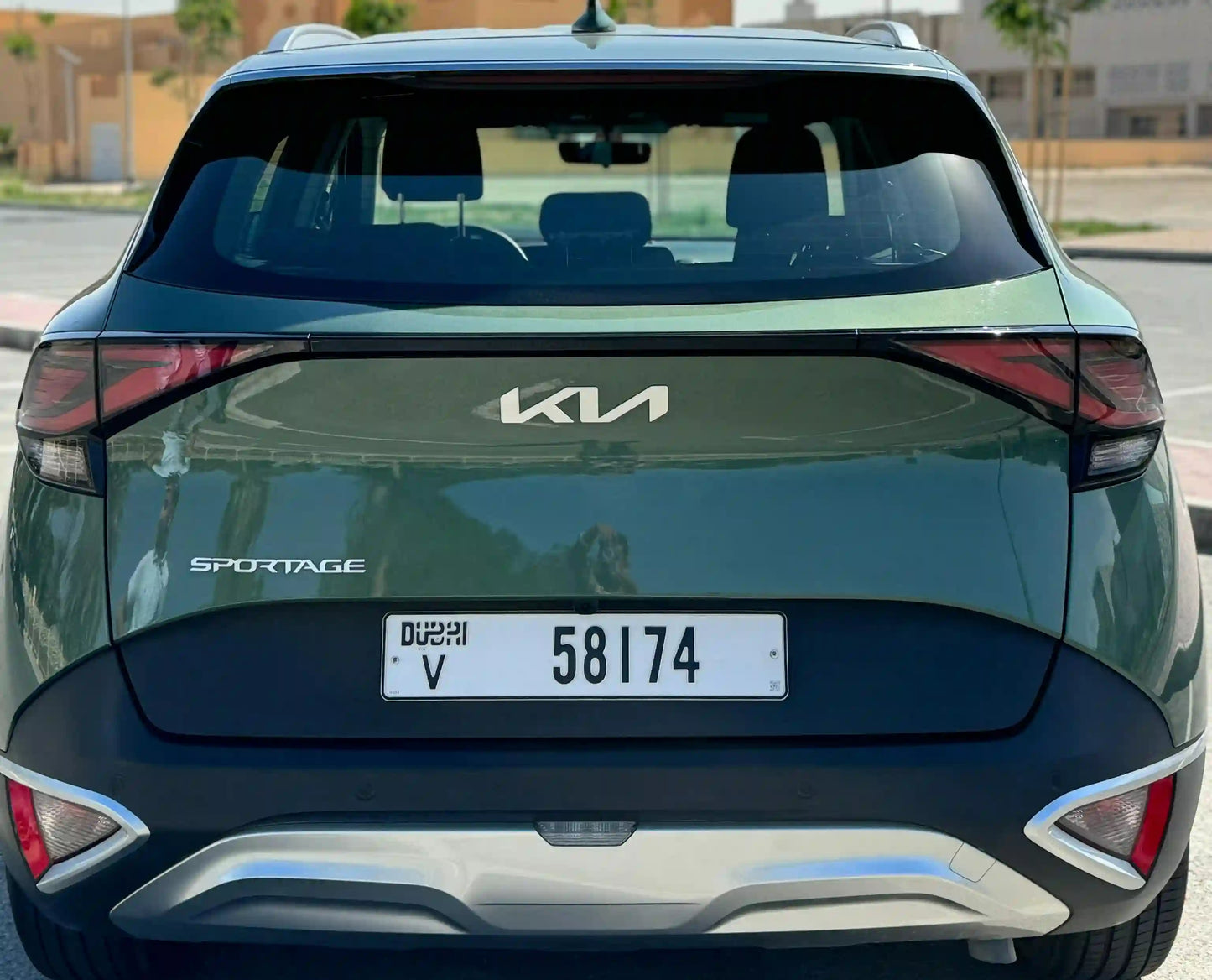 Side profile of the KIA Sportage economy SUV in Dubai, demonstrating its elegant lines and modern silhouette for rent.