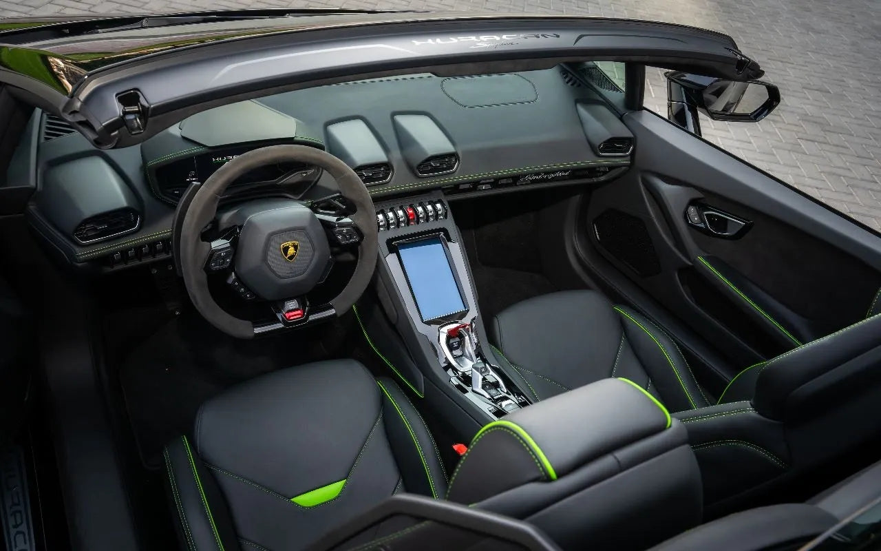 Dynamic angle of Lamborghini Evo Spyder in motion, epitomizing top-tier sports car rental options in Dubai.