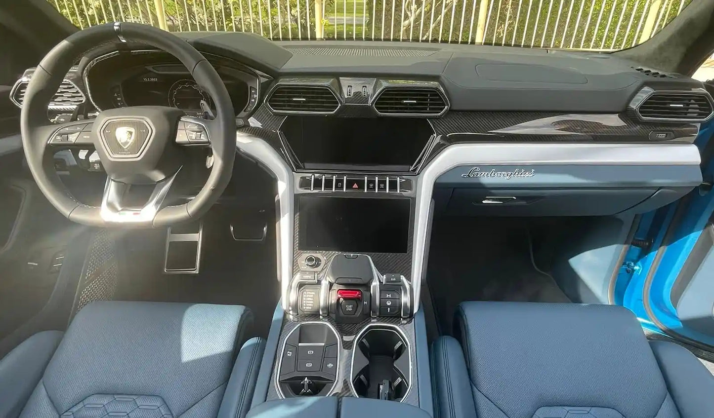 Close-up of Lamborghini Urus wheel and badge, epitome of luxury car rentals in Dubai.