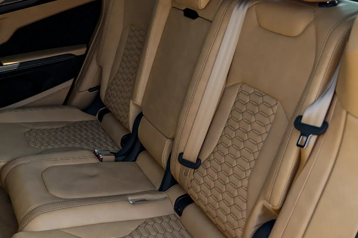 Lamborghini Urus's elegant dashboard and steering wheel, inviting a premium driving experience - available for rent in Dubai.