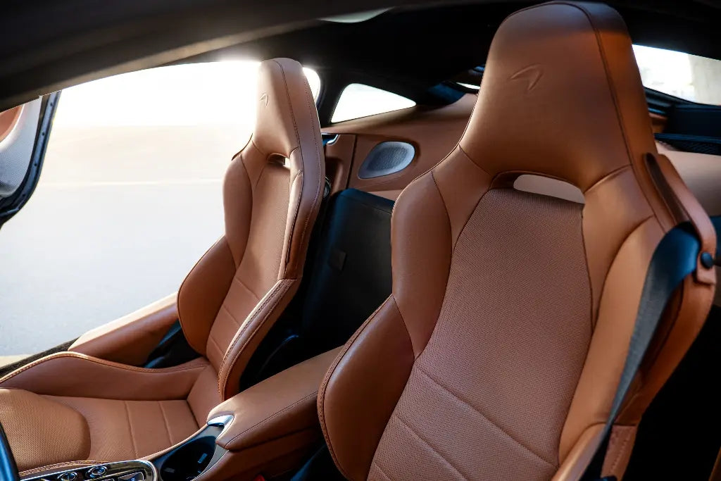 McLaren GT making a statement at a Dubai luxury event, the go-to choice for exclusive car rental services.