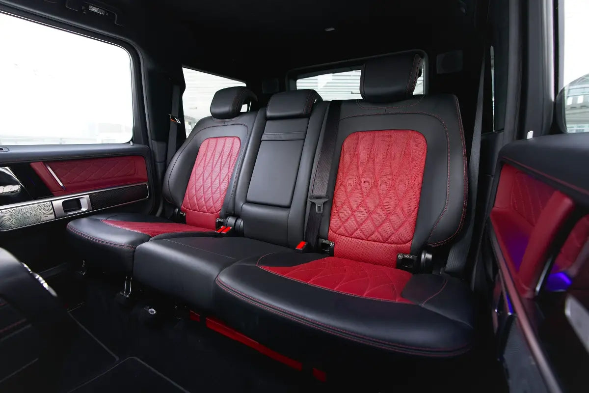 Dynamic angle showcasing the Mercedes-Benz AMG G63's aggressive lines, available for rent in Dubai.
