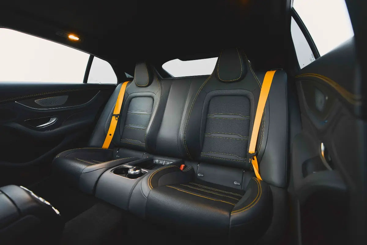 Mercedes Benz AMG GT 63s dashboard and steering wheel, focusing on the high-tech interior features for rent in Dubai.