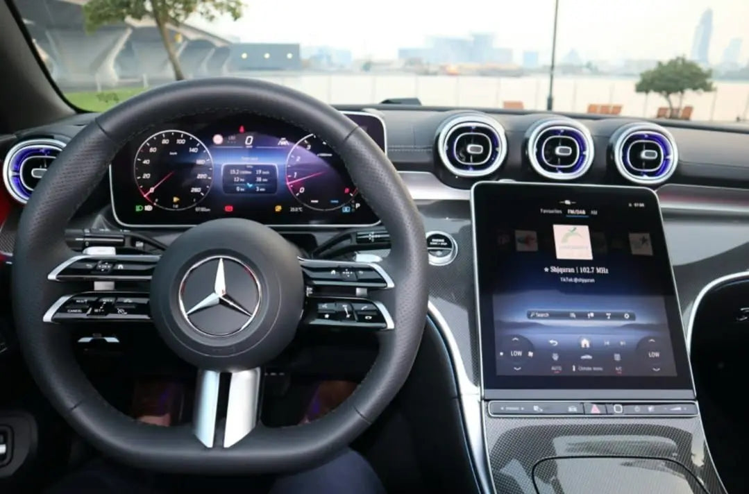 Top-down view of the luxurious Mercedes CLE 300 convertible, capturing the essence of open-air driving in Dubai.