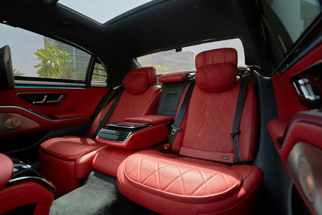 Mercedes S500 S Class dashboard and steering wheel, emphasizing luxury interior for Dubai rentals.