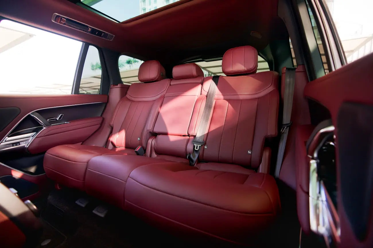 Dynamic off-road driving shot of a Range Rover Vogue, highlighting its versatility and power for rent in Dubai.