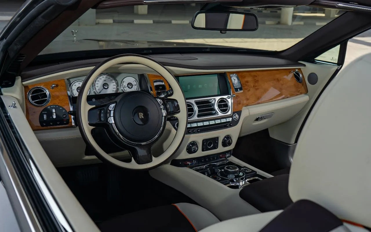 Rolls Royce Dawn with the top down, ready for a memorable drive - rent this luxury convertible in Dubai.
