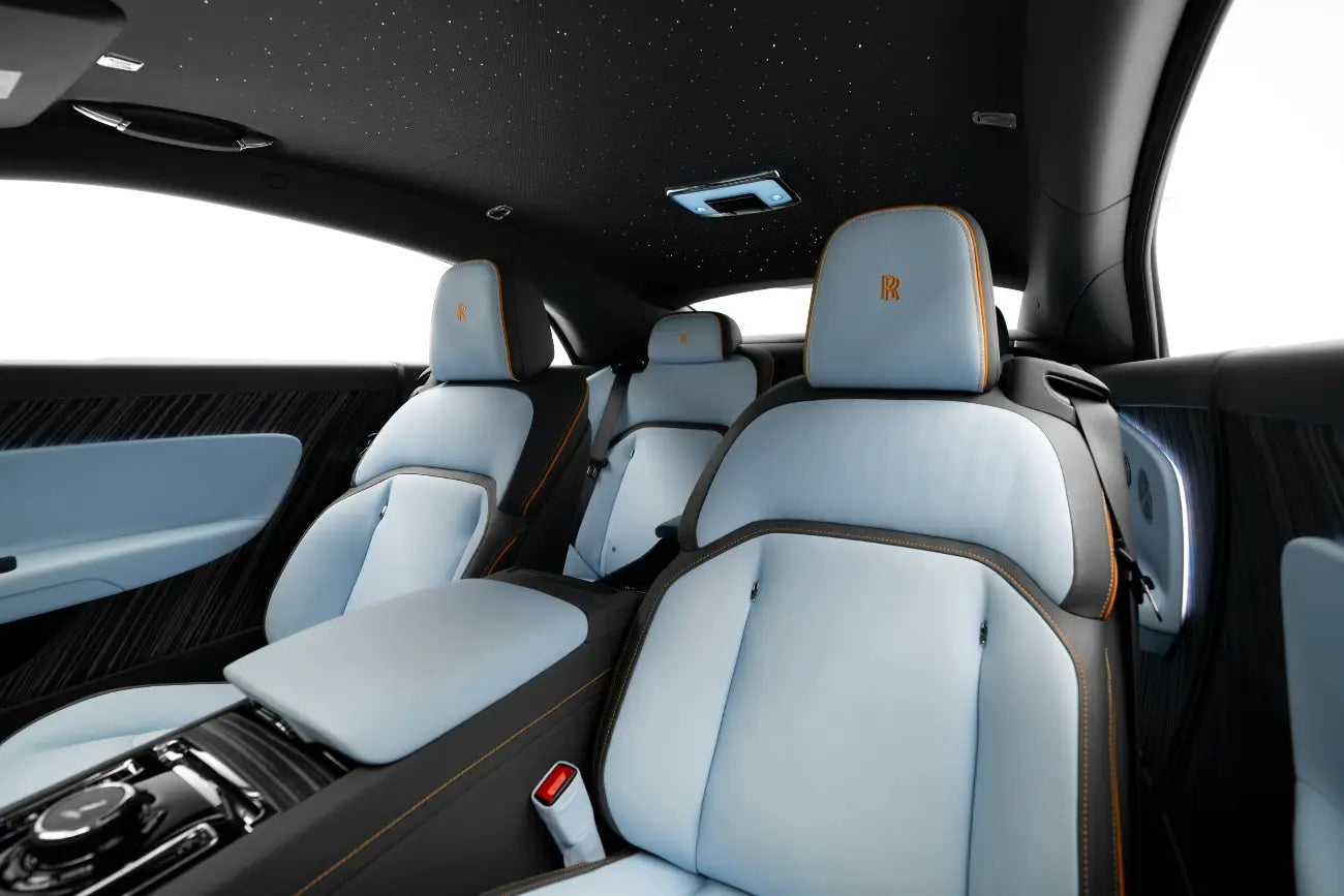 Rolls Royce Spectre, the pinnacle of luxury coupes, parked in a scenic Dubai location ready for rent.