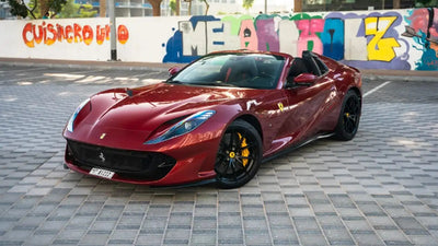 Sleek Ferrari 812 GTS Spyder sports car for rent in Dubai, showcasing its elegant design and speed.