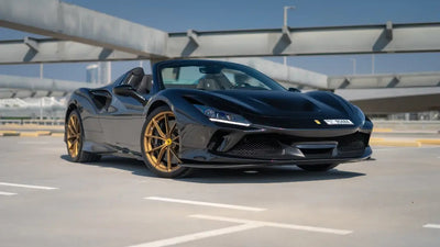 Red Ferrari F8 Tributo Spyder available for rent in Dubai, showcasing its sleek design and sporty silhouette.