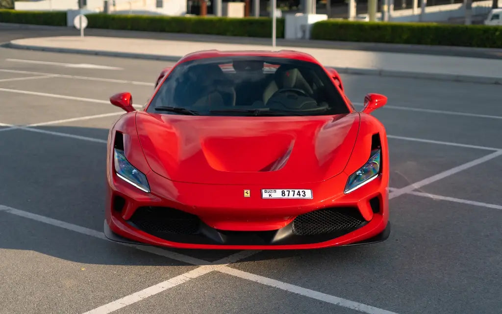 Luxurious interior of a Ferrari F8 Tributo Spyder with leather seats - Rent sports cars in Dubai.