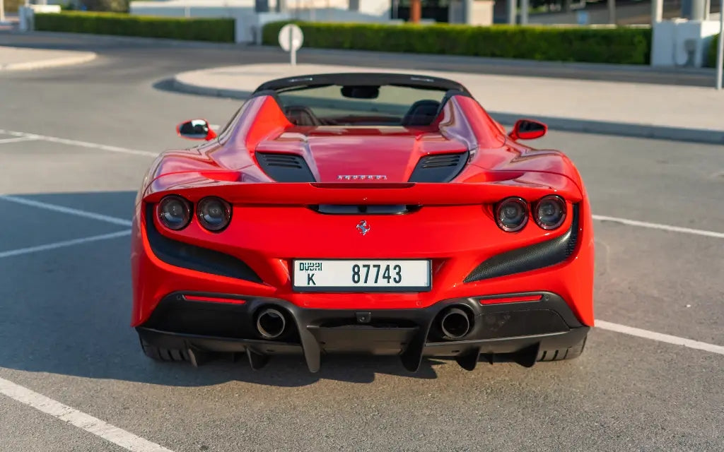 Ferrari F8 Tributo Spyder convertible top down, ready for a sunny Dubai drive - Rent luxury convertibles.