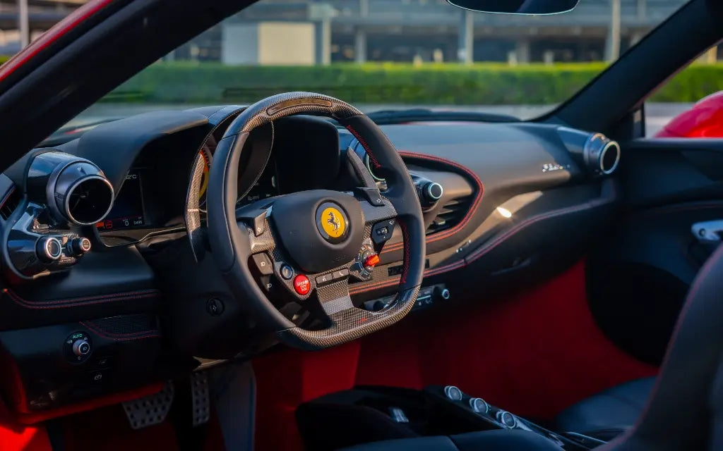 Close-up of the Ferrari F8 Tributo Spyder's distinctive wheel design - Premium car rentals in Dubai.