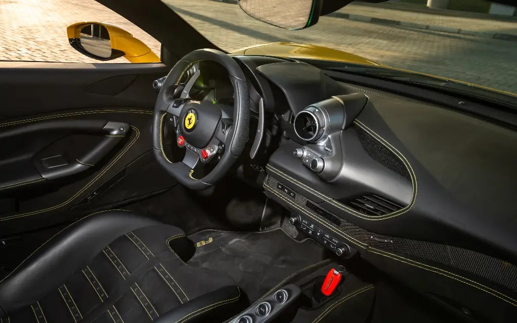 Rear view of the Ferrari F8 Tributo Spyder, highlighting the stylish design for rent in Dubai.