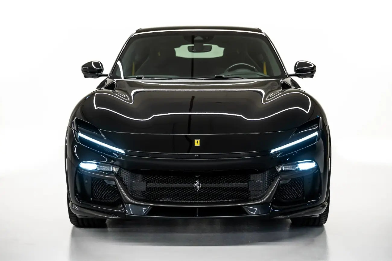 Front view of sleek Ferrari Purosangue V12, the pinnacle of luxury SUVs for rental in Dubai