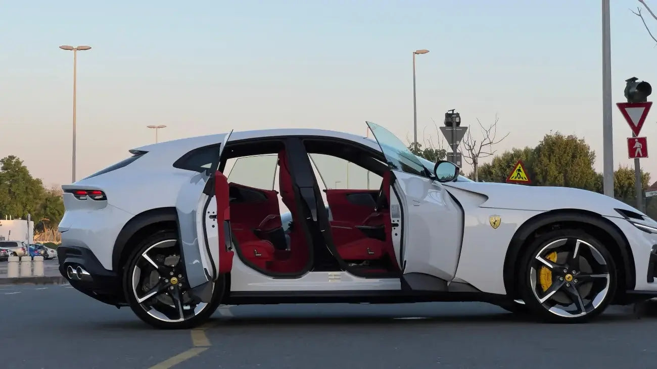 Rear view of the Ferrari Purosangue, highlighting spacious trunk, ideal for Dubai's premium car rental market.