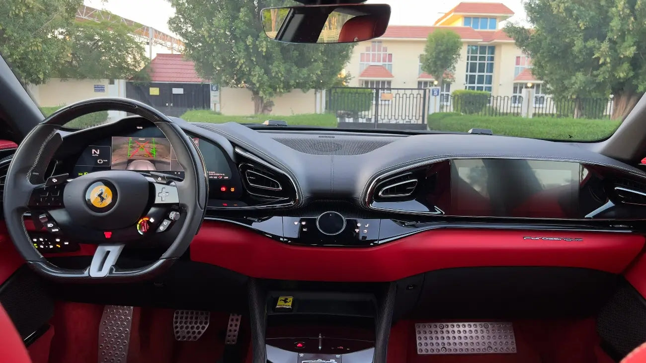 Close-up of the Ferrari Purosangue's alloy wheels and branding, symbolizing top-tier SUV rentals in Dubai.