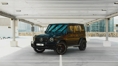 Luxury Mercedes-Benz AMG G63 side view, ready for rent in Dubai, showcasing its sleek design.