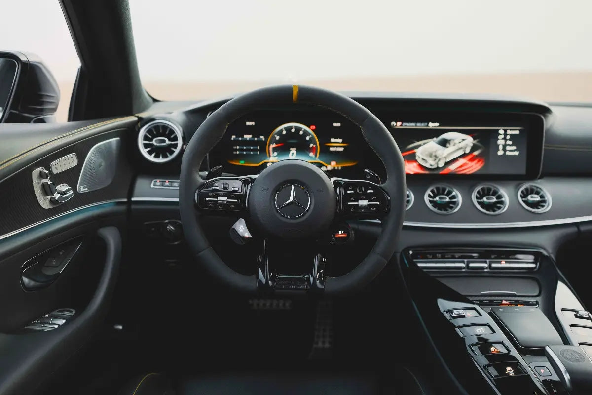 Elegant side profile of the Mercedes Benz AMG GT 63s executive sedan, illustrating the smooth lines for Dubai renters.
