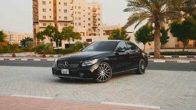 Luxury Mercedes Benz C300 executive sedan side view, available for rent in Dubai.