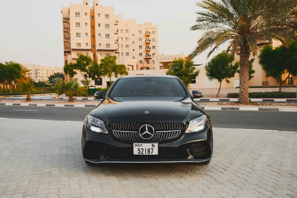 Elegant interior of Mercedes Benz C300, showcasing luxury features for Dubai rentals.