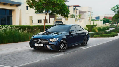 2022 Mercedes-Benz E300 in glossy black, perfect for luxury rental in Dubai, front view.