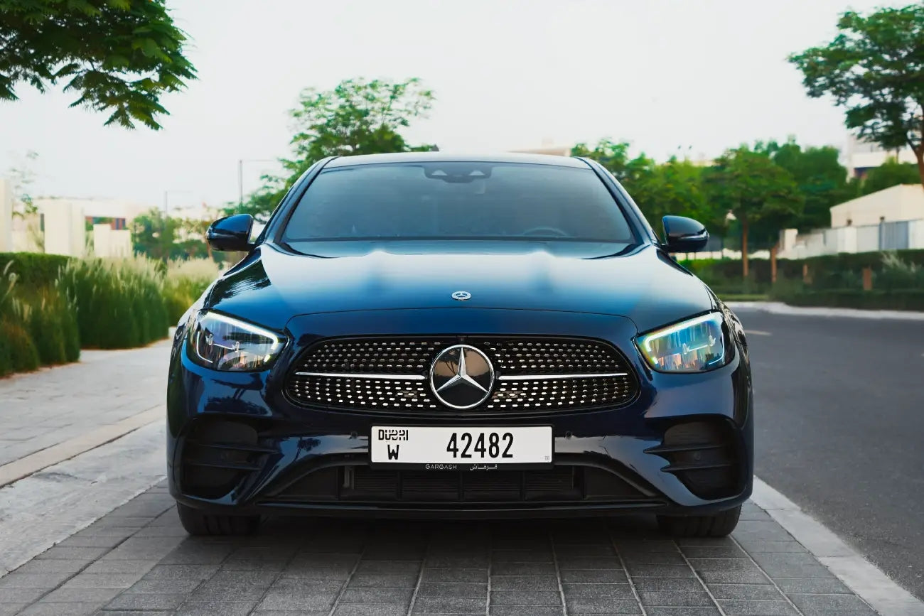 Luxurious interior of 2022 Mercedes-Benz E300, showcasing high-end finishes ideal for Dubai rentals.
