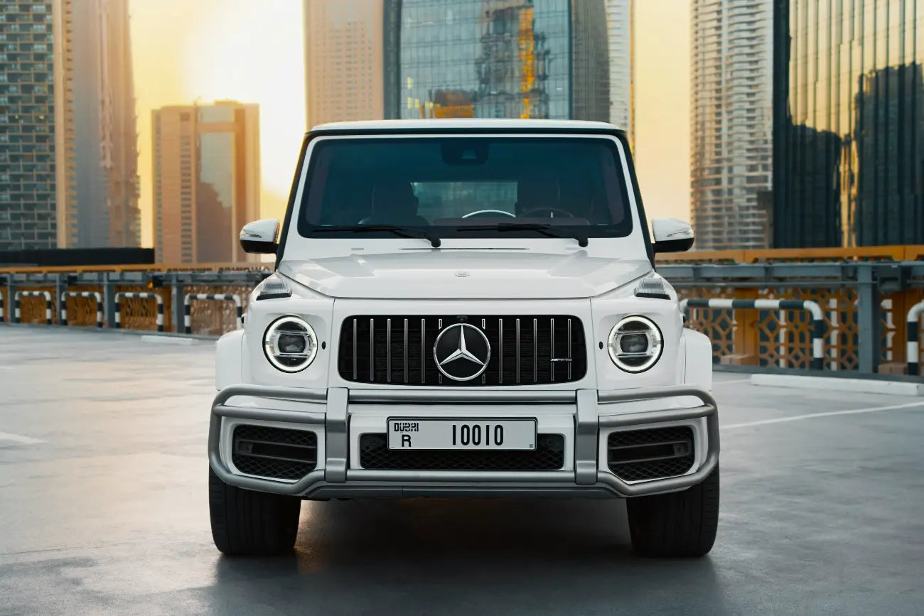 Elegant interior view of a Mercedes Benz G63 available for rental in Dubai, featuring premium leather seats and advanced tech.
