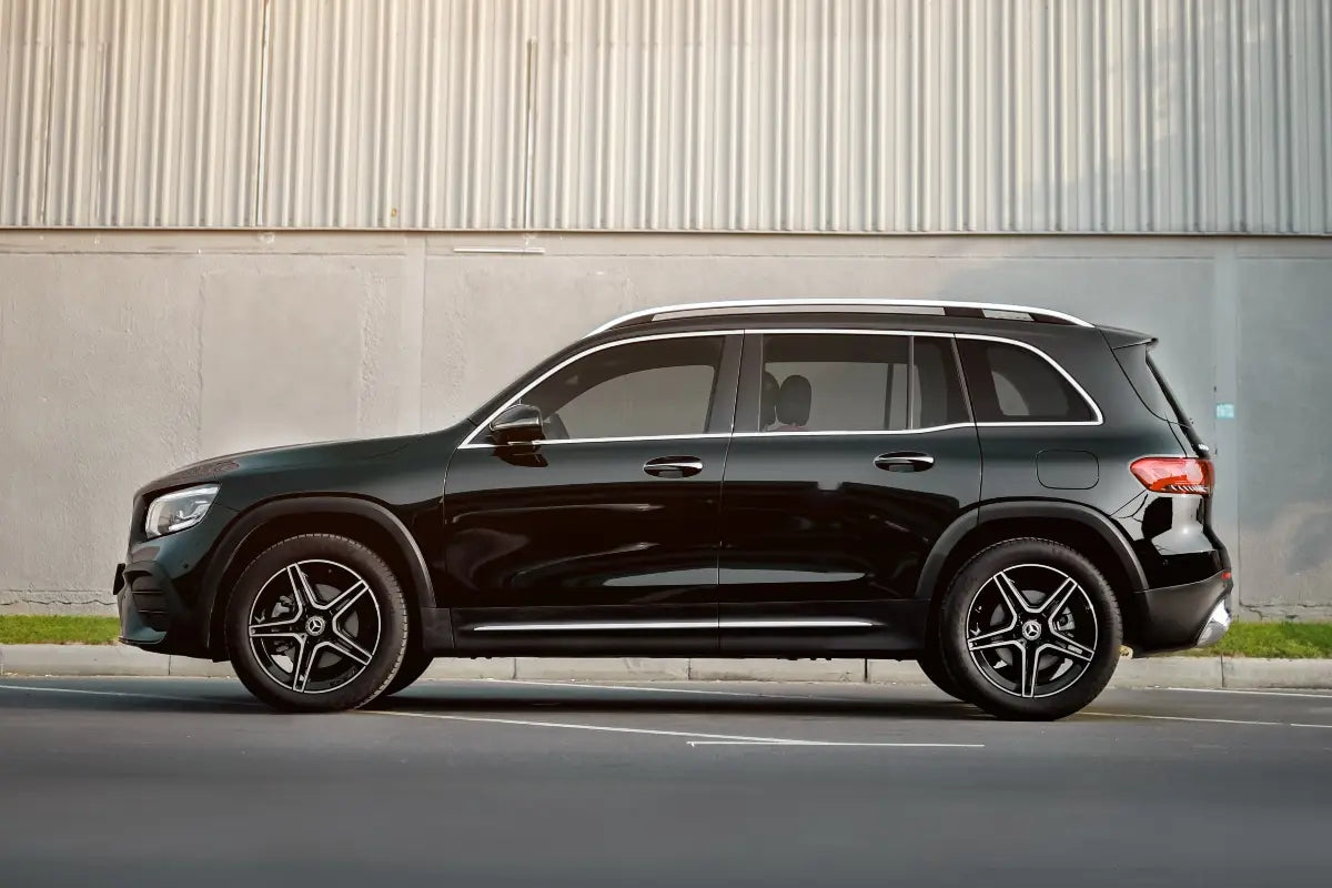 Rear angle of the Mercedes Benz GLB 250, emphasizing the SUV's elegant taillights and ample cargo space, available in Dubai.