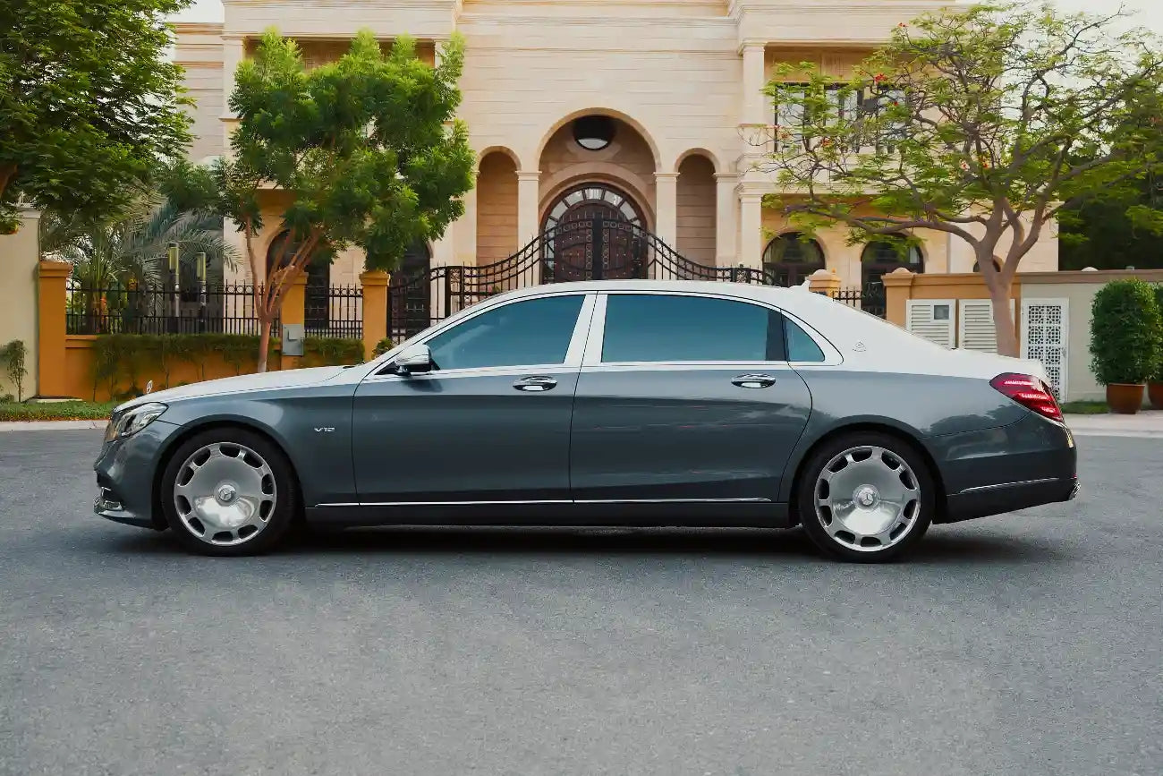 Rear angle of Mercedes Benz Maybach S650, emphasizing the sleek design and tail lights - ideal for stylish Dubai tours.