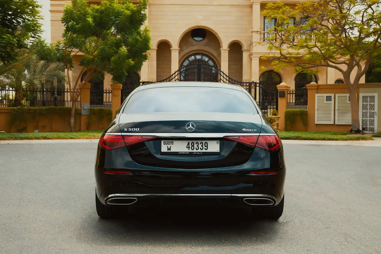 Front angle view of a sleek 2021 silver Mercedes-Benz S500, highlighting the iconic grille and LED headlights - Dubai car rental