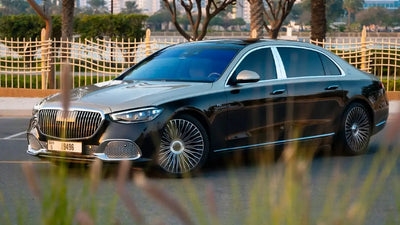 Luxurious silver Mercedes Benz S680 Maybach front view, available for rent in Dubai.