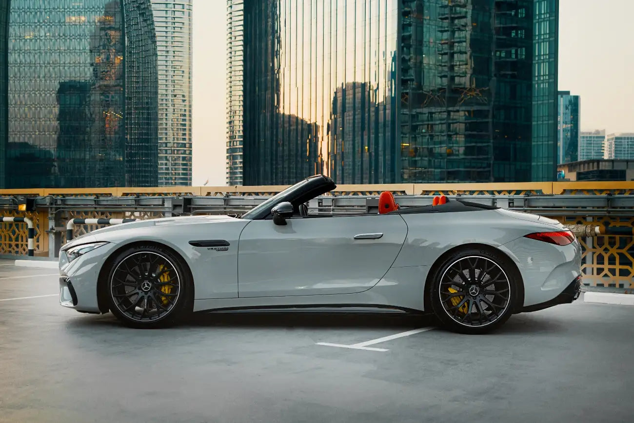 Stunning rear angle of a convertible Mercedes-Benz SL63 AMG, perfect for cruising in Dubai.