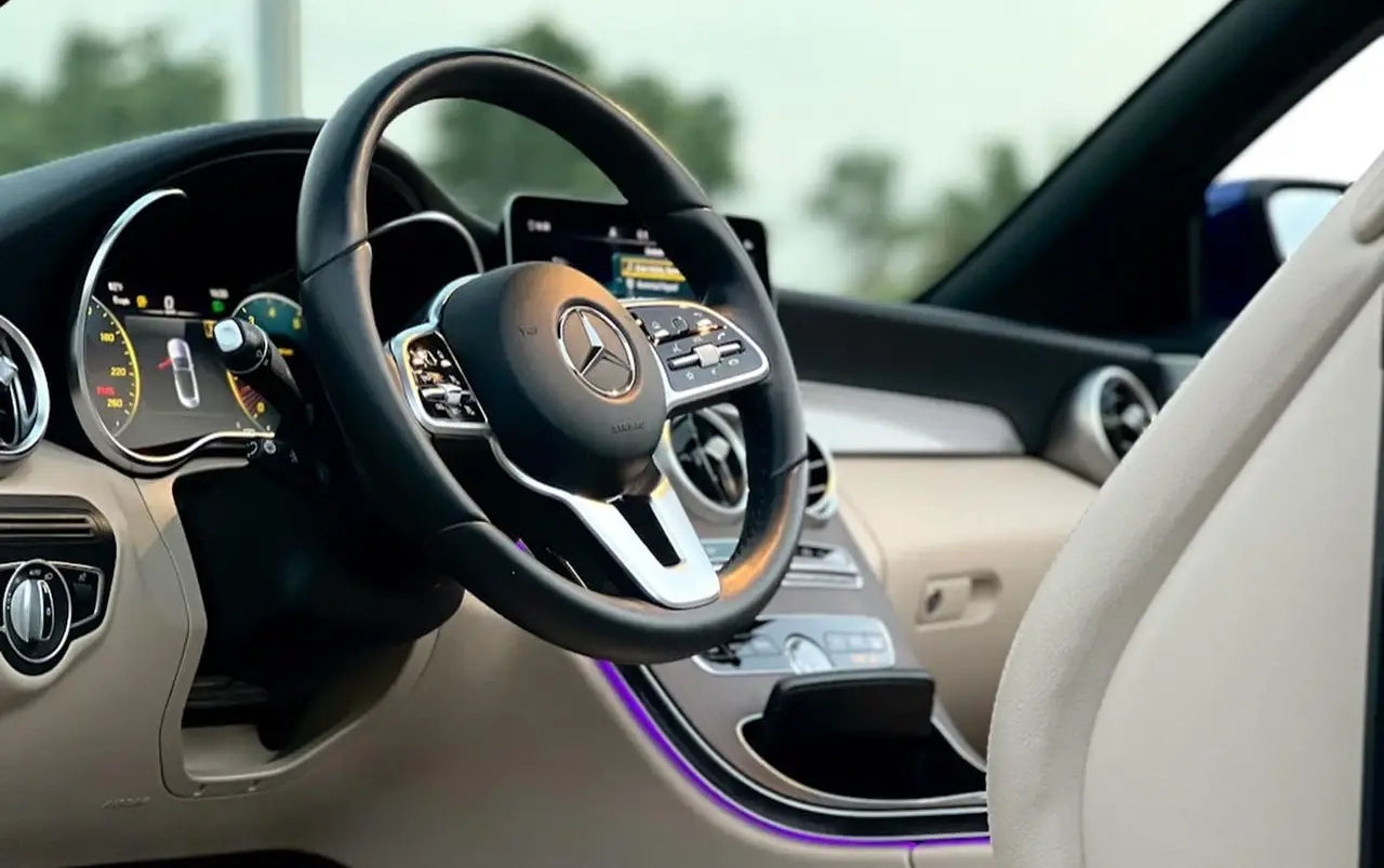 Mercedes C300 Convertible from a rear angle, showcasing its dynamic design, available in Dubai.