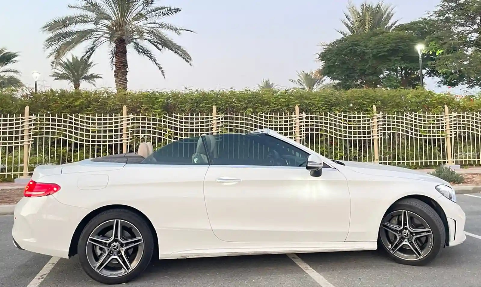 Close-up of the sleek interior of a Mercedes C300 Convertible for rent in Dubai, showcasing luxury detailing.