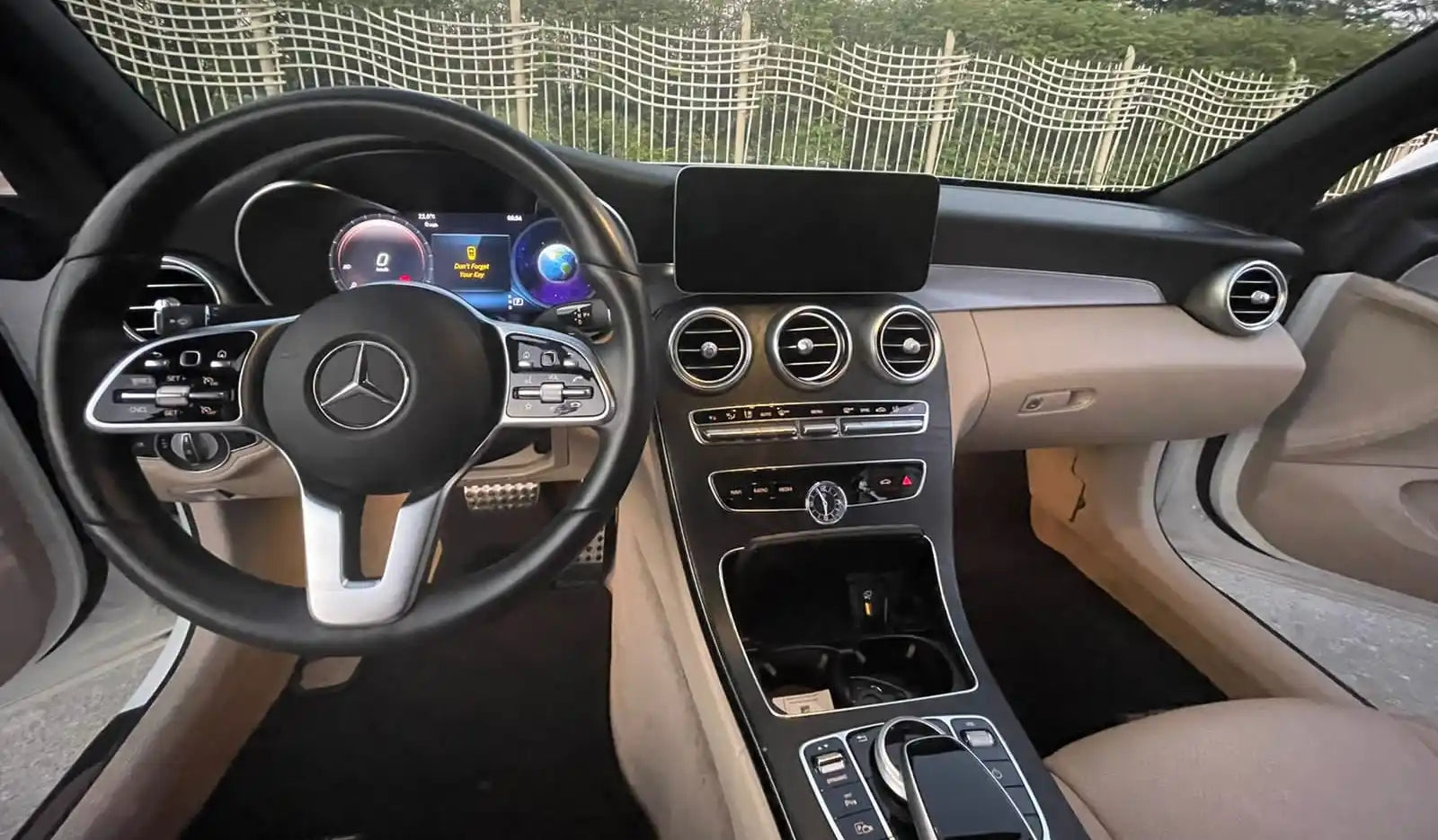 Mercedes C300 Convertible with the top down, ready for an unforgettable driving experience in Dubai.