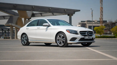 Luxury Mercedes C300 Executive Sedan parked for rent in Dubai - sleek design