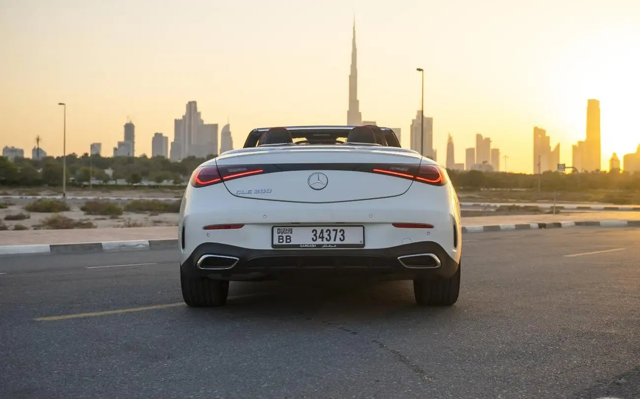 Mercedes CLE 200 convertible with top down ready for a scenic Dubai drive, luxury rental dream.