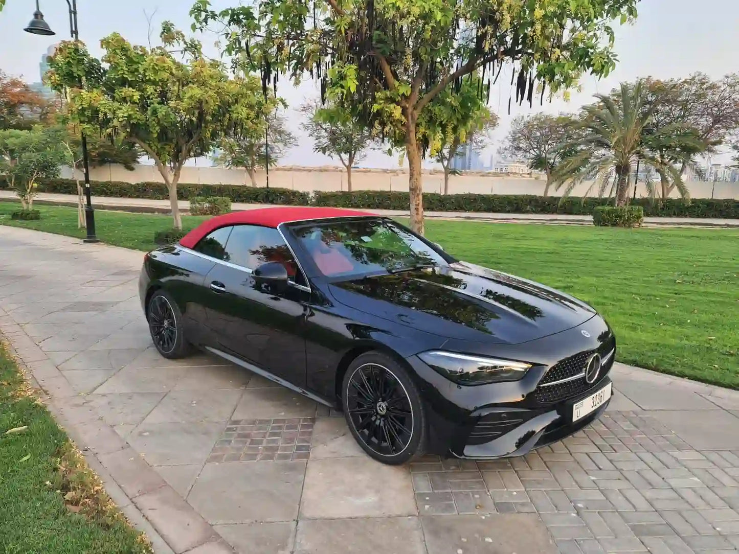 Gleaming Mercedes CLE 300 luxury convertible ready for rent in Dubai, showcasing its sleek design and elegance.